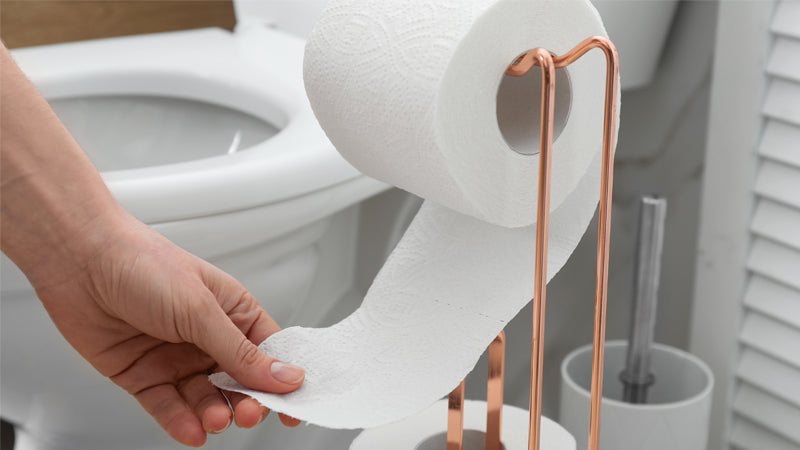“bamboo tissues next to recycled paper tissues with eco-friendly packaging”